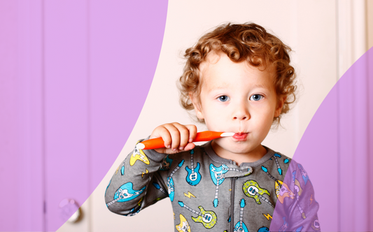 Why is brushing my child's teeth twice per day important?